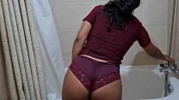 A young, attractive girl showering