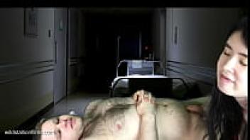 A large white cock is revived by an Asian female doctor.