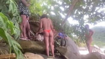 On the beach, couples orgy in front of everyone.