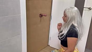 Milf at the glory hole, sucking cock