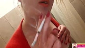 Big Tits MILF play with Tits' next oily boobs while smoking and making red lips.