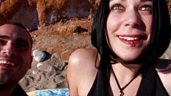 On the beach, a curvy woman was adored.