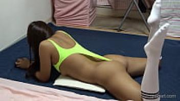 Japanese surfer lady with a fantastic figure, large tits, thong wedgie ass, and thong wedgie pussy exercising in a thong leotard