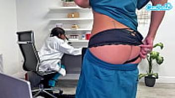At work, a sexy big-tit MILF nurse masturbates.