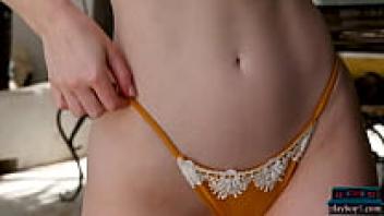 Erna Ohara, a big butt redhead MILF model, is showcasing herself in a solo striptease.