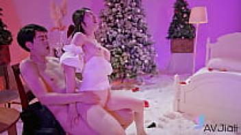 Big-titted Chinese Jiaxin's wet, shaven pussy is prepared for intercourse.