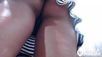 Fetish upskirt beneath the attractive brunette's skirt