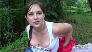 Enjoying a picnic in the woods with a young, plump sofa