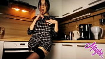 A serious teacher wearing large glasses enjoys using her magic wand to cum.