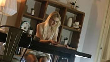 An all-natural, gorgeous blonde wife with enormous breasts in a seductive white summer dress teases to entice