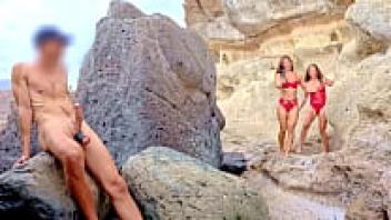 BEACH HANDJOB: I discovered the two girls flashed in the parking lot while on my exhibit tour.