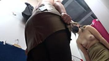 In public, Voyeur glances beneath her skirt. Additionally, a female in nylon tights with a luscious ass is spied on by a hidden camera in a fitting room. Foot fetish.