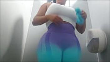 Camera footage of a large ass and a curvy girl in the gym's public restroom