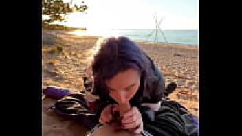 On the beach, blowjob