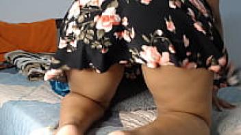 There's a gorgeous Latina teen with a leaking pussy underneath the garment.