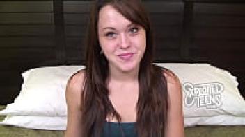 This amateur porn features a petite brunette teen with a shaved cunt.